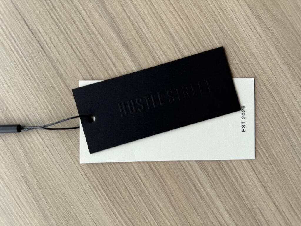 Cankun-produced black-and-white hang-tag sample set with string attachment
